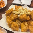 더썬치킨 로고