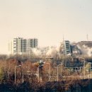 국내에서 처음으로 남산 외인아파트를 폭파하는 장면 이미지
