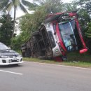 27 passengers including bridegroom cheat death as bus overturns 이미지