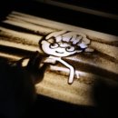 빛과 모래로 그리는 샌드아트 이미지