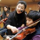 장애인 오케스트라 11년째 이끄는 바이올리니스트 이미지
