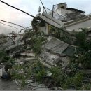 Hundreds of thousands may have died in Haiti quake, PM says 이미지