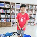 농성초등학교 5학년 이동아 군의 자전거 기부 소식 이미지