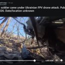 참호 안에서 우크라 드론을 폭파시키는 러시아 군인 이미지