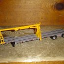 DCP Stepdeck Trailer with Yellow Unloader Grapple 1/64 이미지