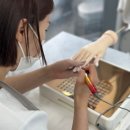 손끝에서 피어나는 네일아트 이미지