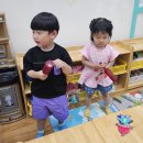 키즈잡스.행복을 전하는 트롤 인형 이미지