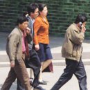 북한 간부들이 휴대전화 사업에 발담그려고 이미지