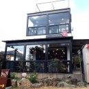 "겨울에만 만날 수 있는 붉은 풍경" 테라스에서 바라보는 동백꽃 명소 이미지