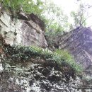 급커브 도로변 마을 이미지