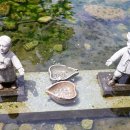 동전던지기 조형물 이미지