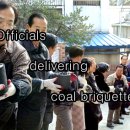 영자신문 쉽게 읽는 법 Officials are delivering coal briquettes. December 22, 2004 이미지